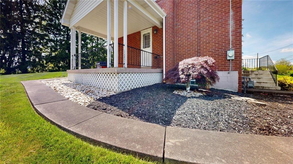 121 Rosemont Drive Coraopolis, PA 15108 - Photo 24 of 29 a front view of a house with garden