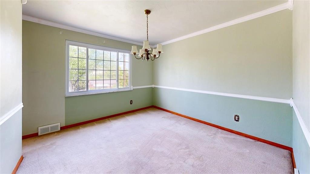 121 Rosemont Drive Coraopolis, PA 15108 - Photo 7 of 29 a view of an empty room with a window