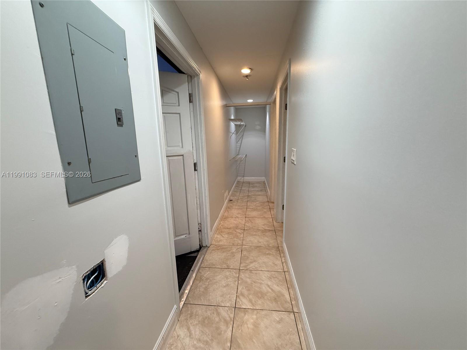 5488 Fearnley Road Lake Worth, FL 33467 - Photo 29 of 40 a view of a hallway