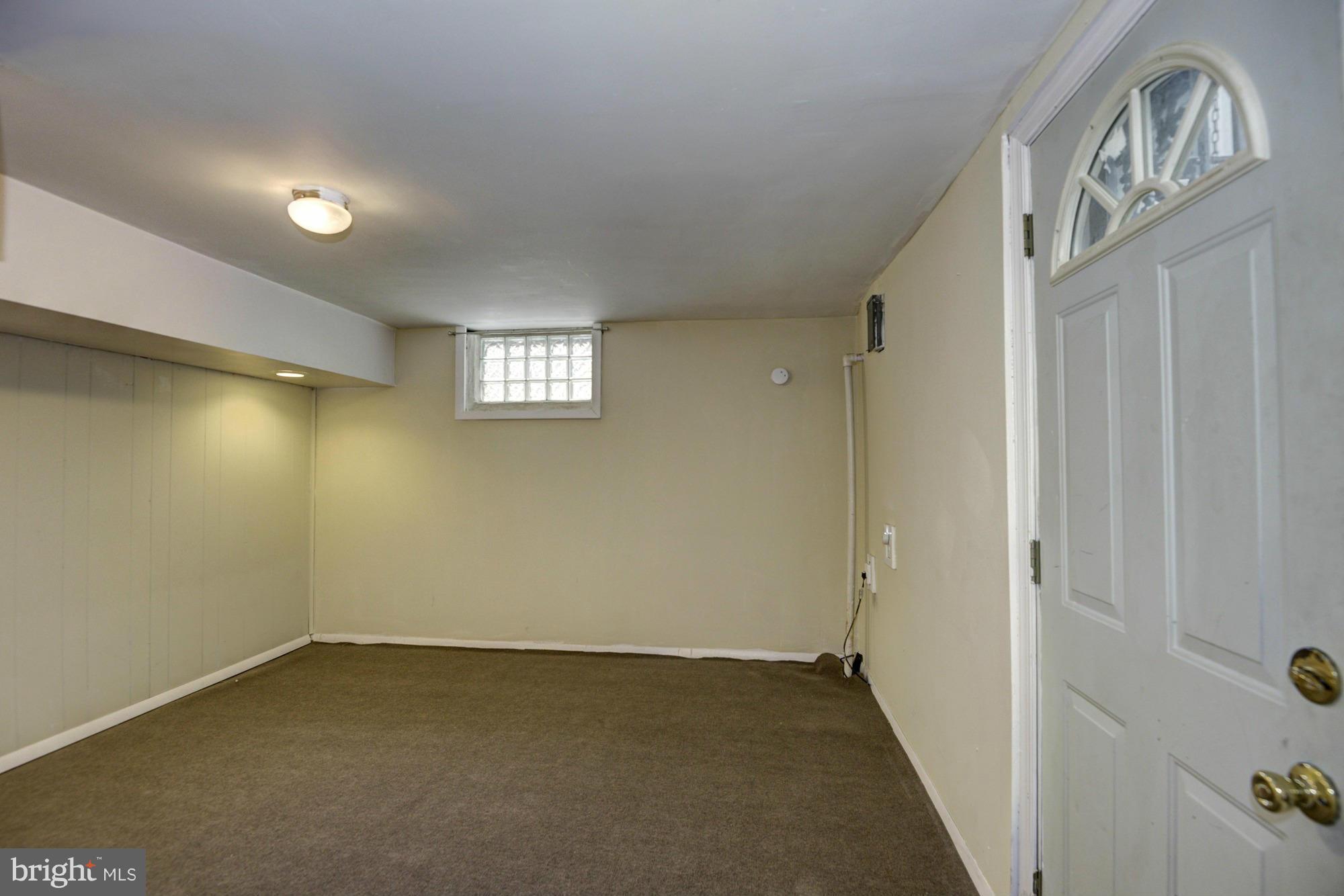 3903 Tiverton Road Randallstown, MD 21133 - Photo 17 of 20 Den w/ Walk-Out