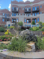 7738 North Sheridan Road, Unit 4L Chicago, IL 60626 - Photo 24 of 30 a view of a brick building next to a yard