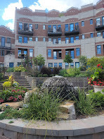 7738 North Sheridan Road, Unit 4L Chicago, IL 60626 - Photo 29 of 30 a view of a brick building next to a yard