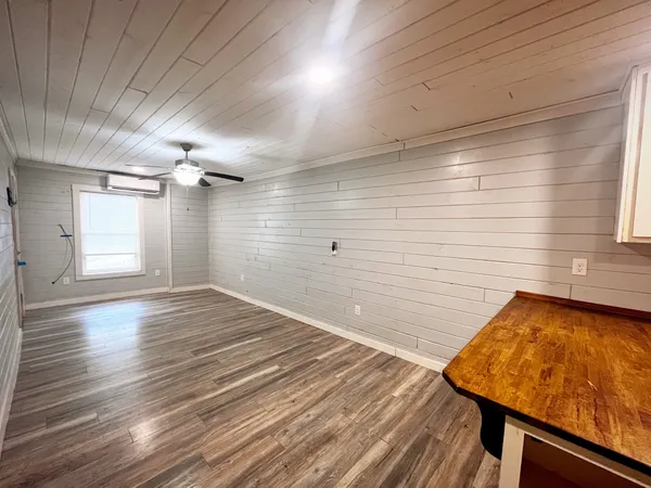 a bathroom with a sink and mirror