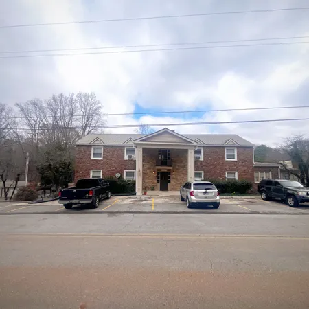 a view of a house with a street