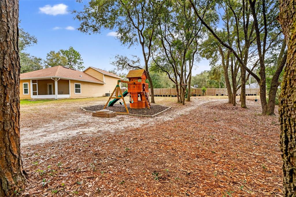 30 Deer Trail Circle Bronson, FL 32621 - Photo 46 of 55 a view of a house with a yard
