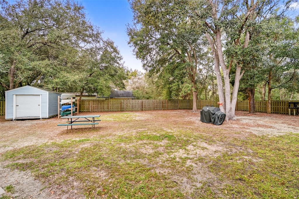 30 Deer Trail Circle Bronson, FL 32621 - Photo 47 of 55 a view of a playground with basketball court