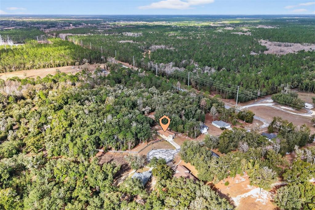 30 Deer Trail Circle Bronson, FL 32621 - Photo 50 of 55 a view of a city with green field