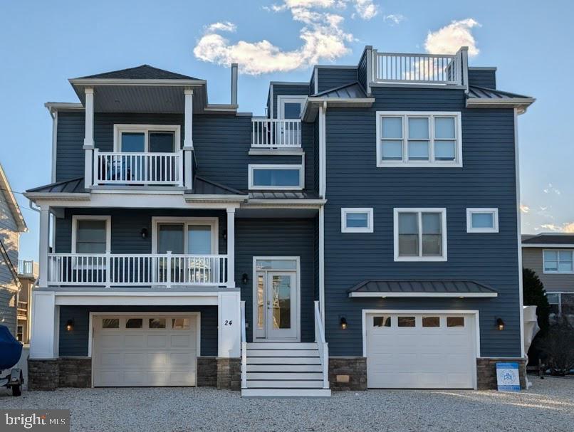 a front view of a house with a garage