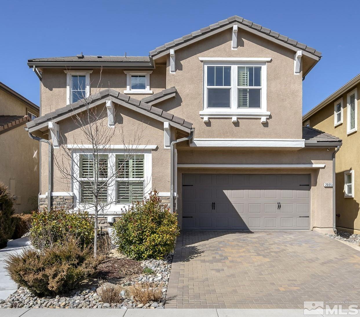 2055 Hope Valley Drive Reno, NV 89521 - Photo 1 of 21 a front view of a house with a yard