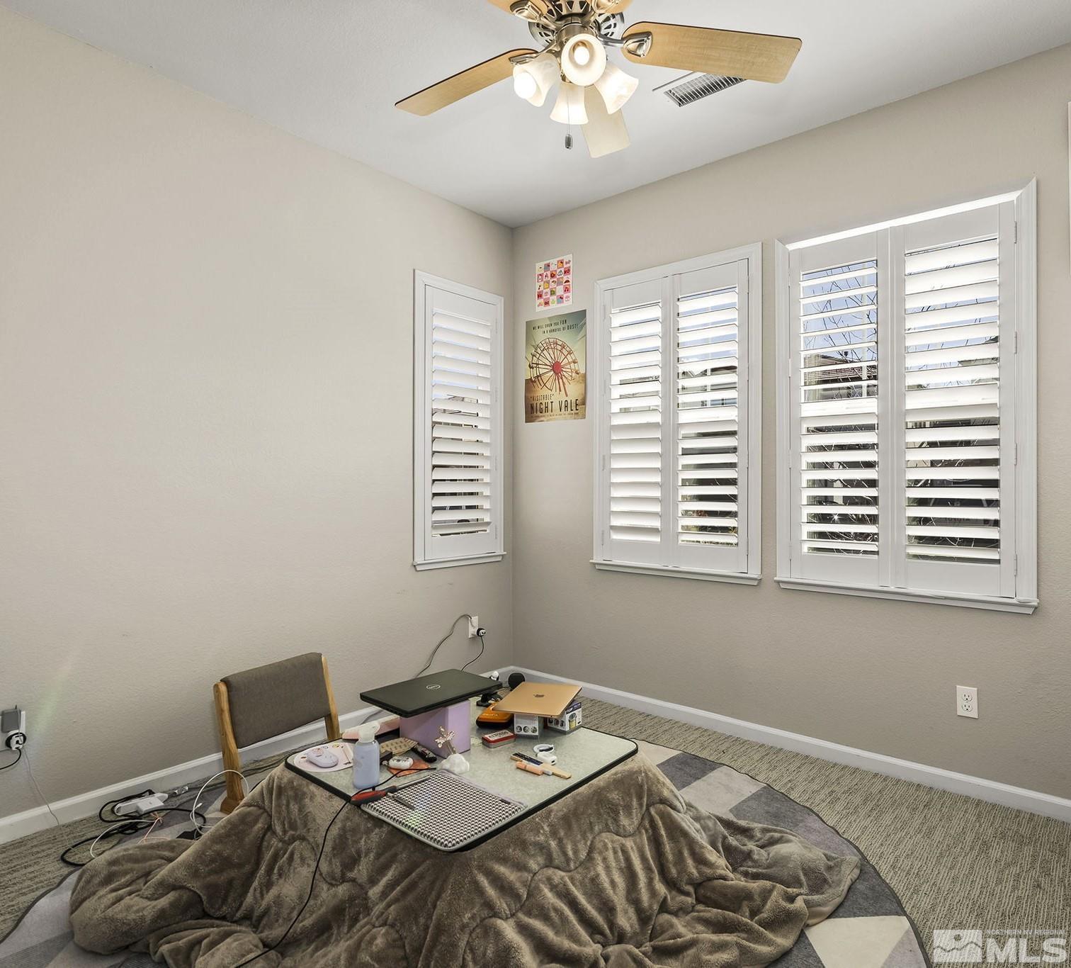 2055 Hope Valley Drive Reno, NV 89521 - Photo 16 of 21 a view of a workspace with furniture and a window