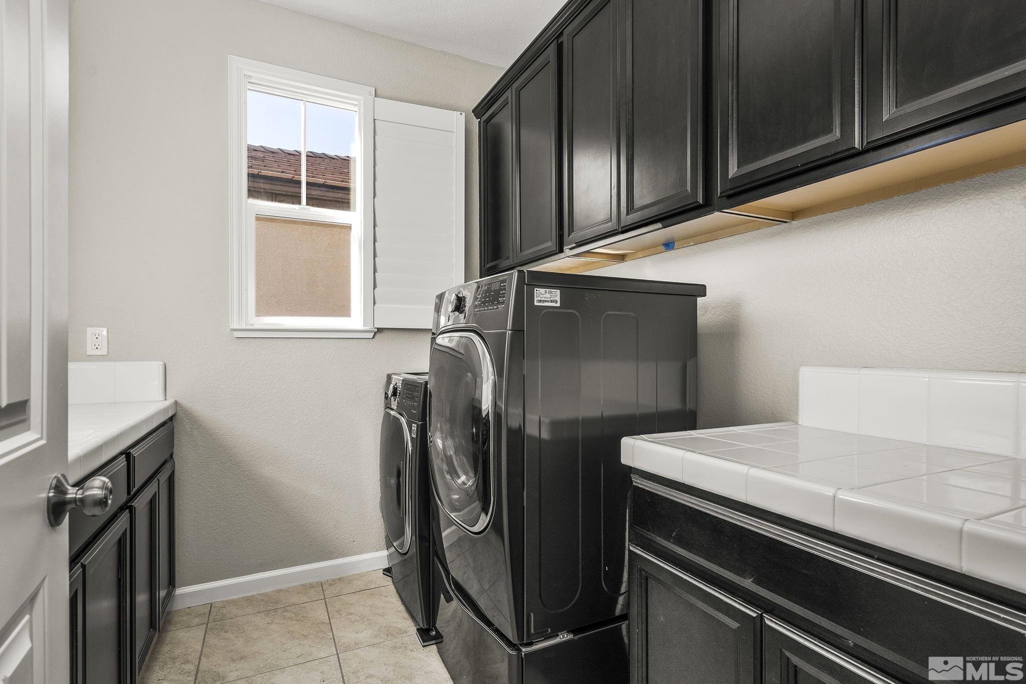 2055 Hope Valley Drive Reno, NV 89521 - Photo 17 of 21 a kitchen with stainless steel appliances a refrigerator and a stove