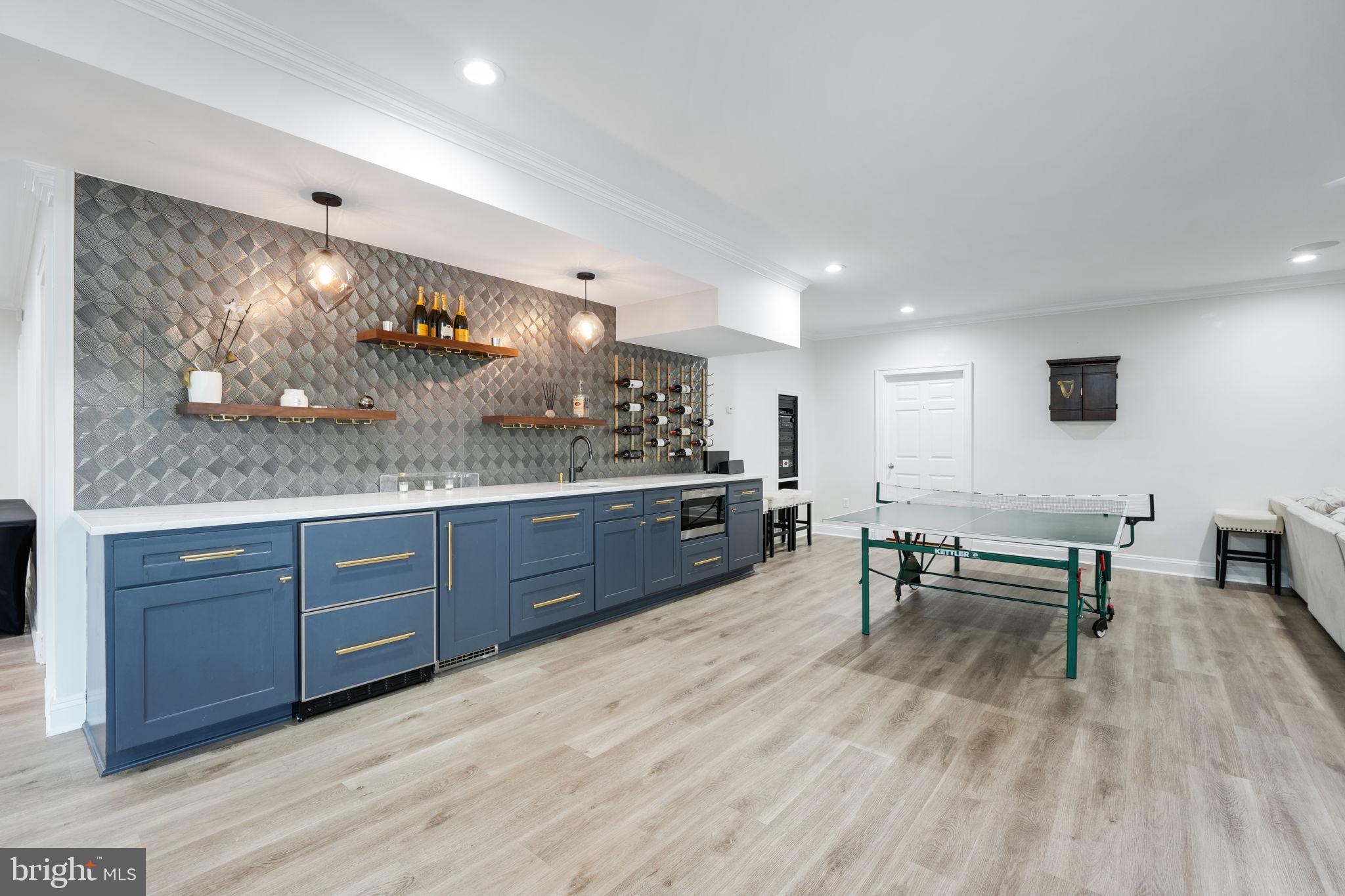 492 River Bend Road Great Falls, VA 22066 - Photo 44 of 68 Lower Level Recreation Area with bar