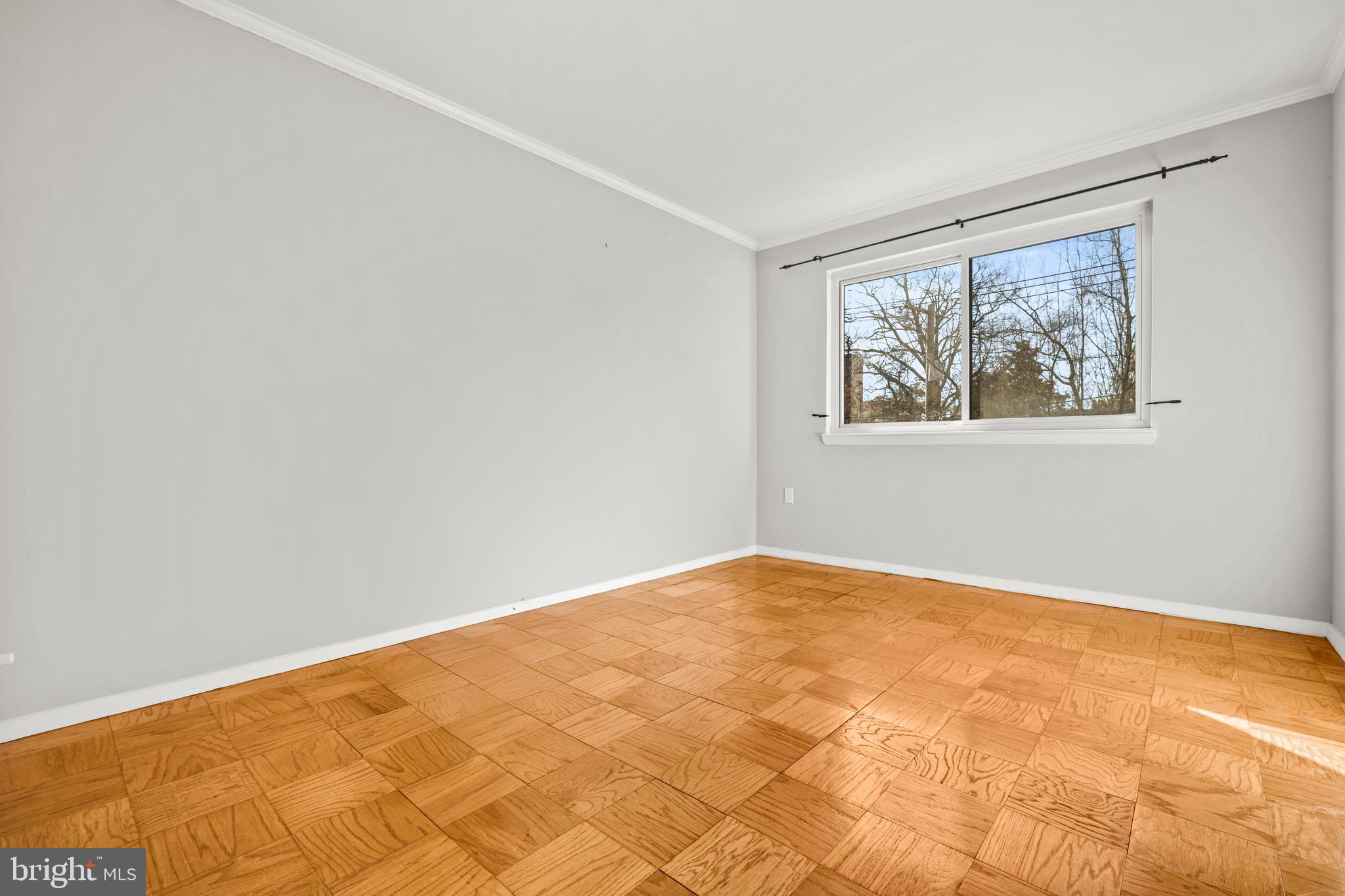 4555 MacArthur Boulevard Northwest, Unit 202 Washington, DC 20007 - Photo 14 of 27 a view of an empty room with a window