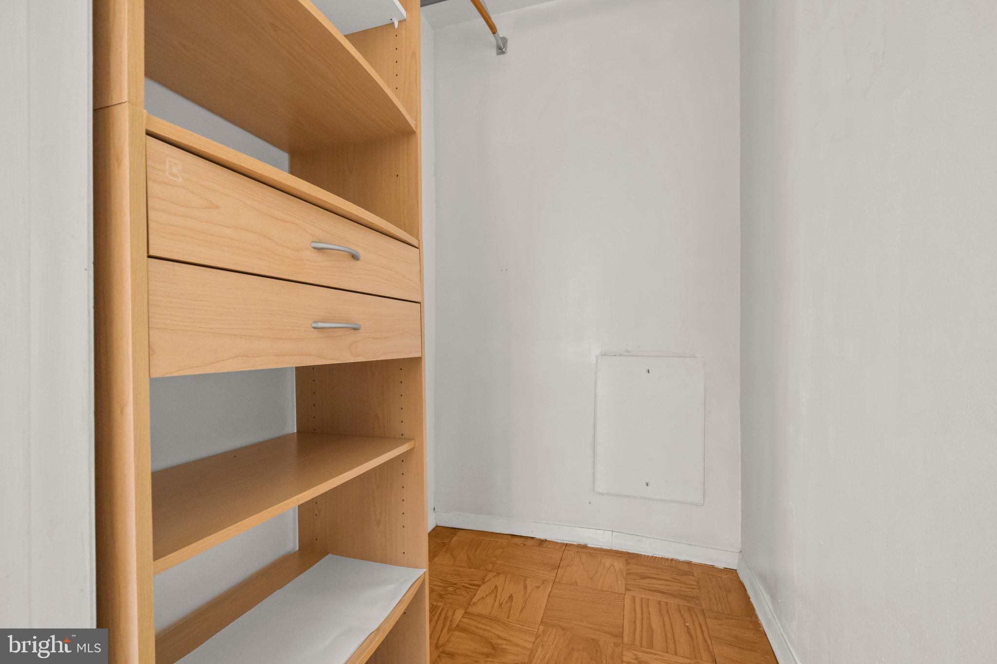 4555 MacArthur Boulevard Northwest, Unit 202 Washington, DC 20007 - Photo 17 of 27 a view of walk in closet with empty racks