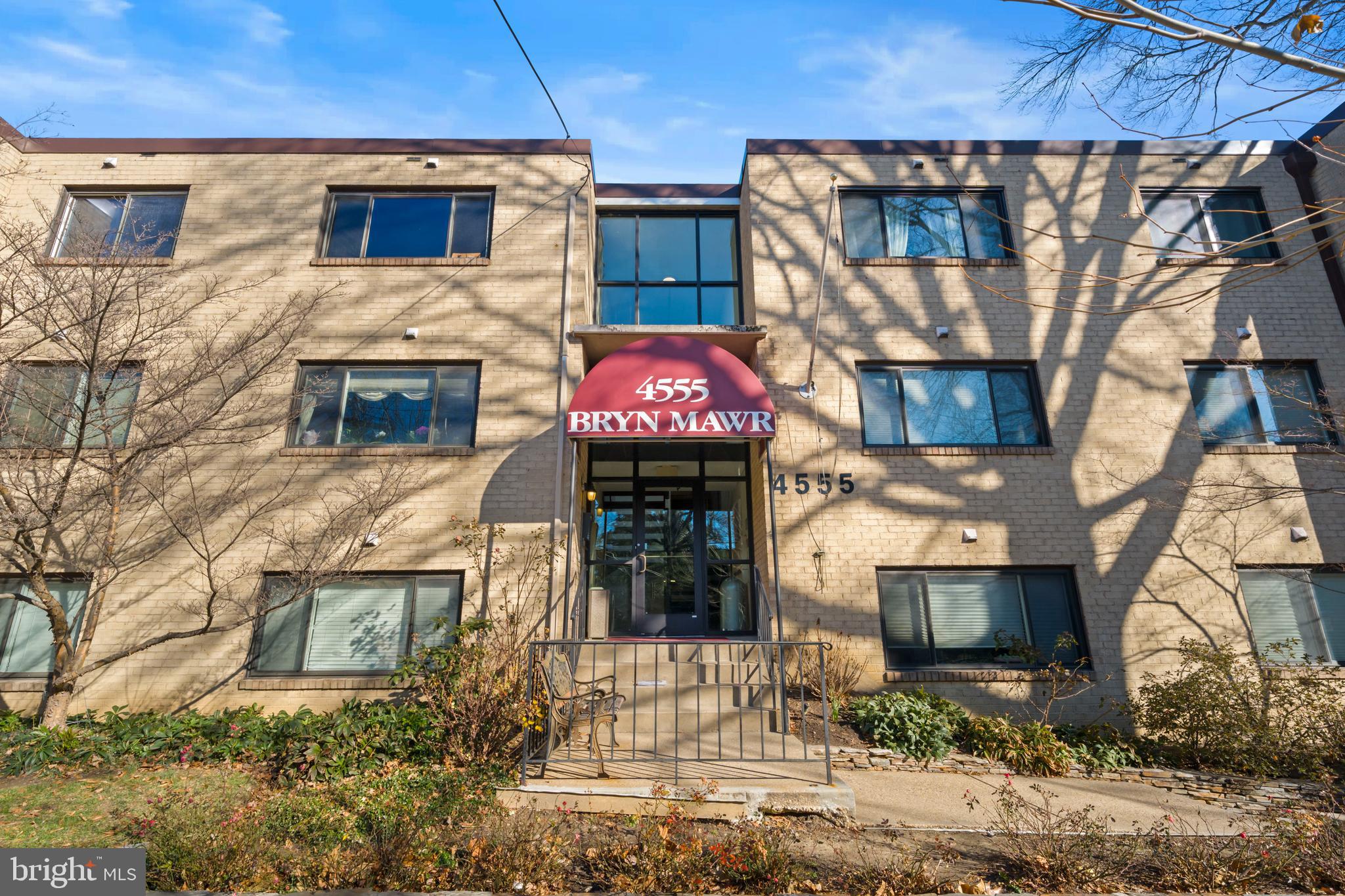 4555 MacArthur Boulevard Northwest, Unit 202 Washington, DC 20007 - Photo 27 of 27 a front view of a house with parking space