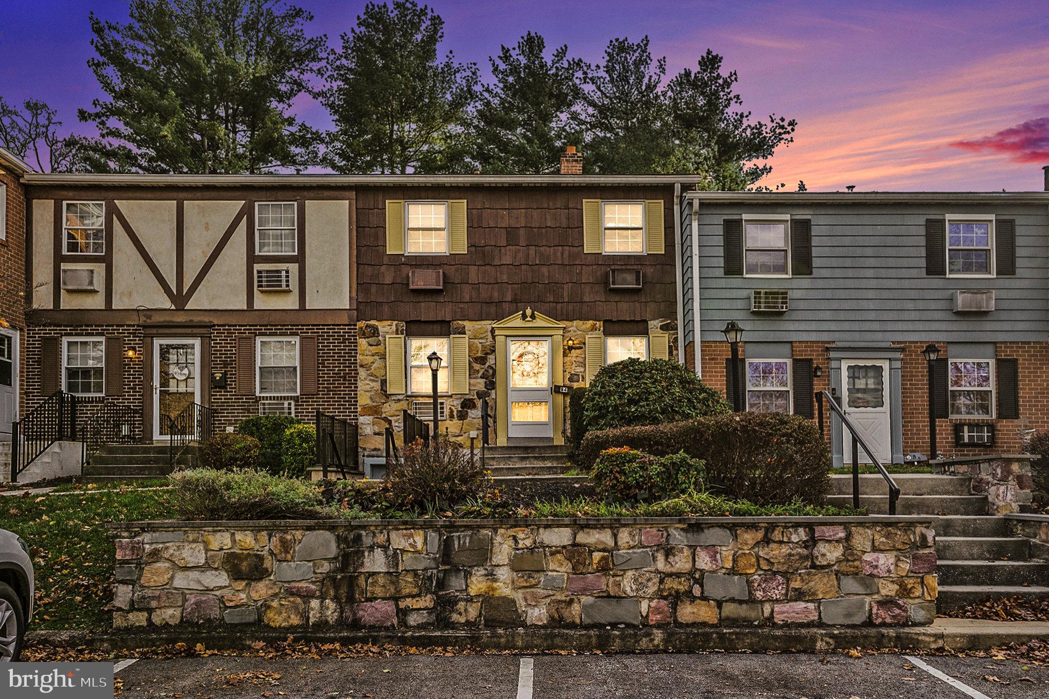 207 Walnut Hill Road, Unit B4 West Chester, PA 19382 - Photo 1 of 35 a front view of a house with garden