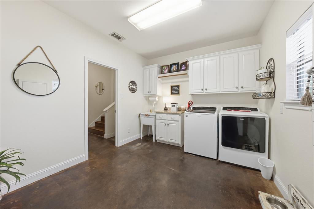 5262 Rio Vista Malakoff, TX 75148 - Photo 22 of 29 a view of a kitchen with white cabinets and white appliances