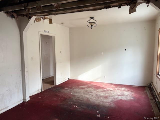 114-06 167th Street Queens, NY 11434 - Photo 5 of 23 Unfurnished room featuring carpet flooring