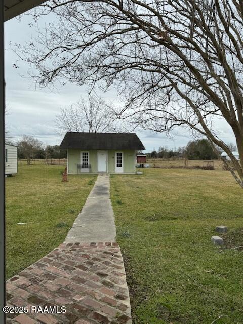 302 Olivier Road Church Point, LA 70525 - Photo 31 of 50 Walkway to buidlings, pasture