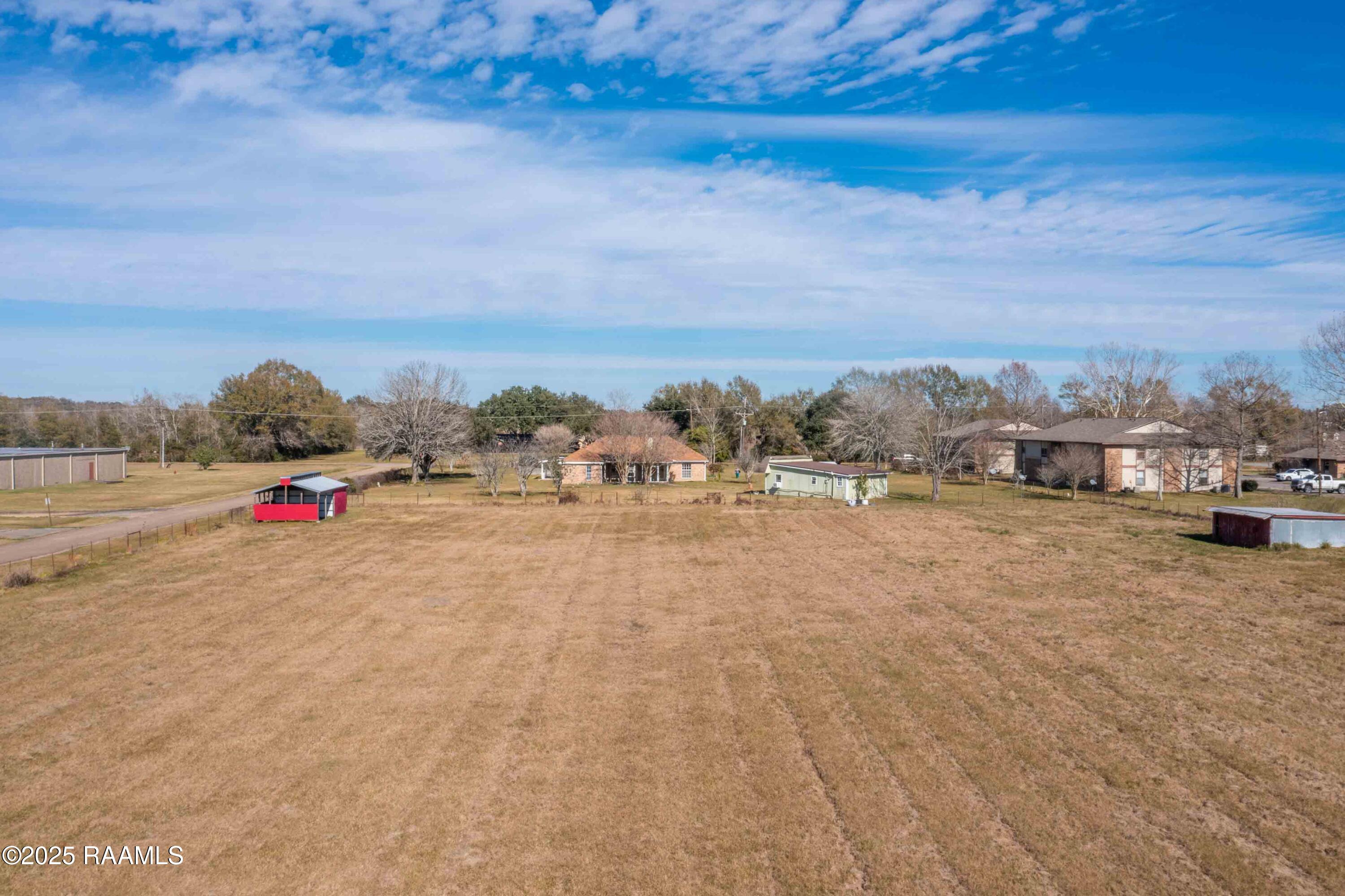 302 Olivier Road Church Point, LA 70525 - Photo 38 of 50 Pasture and barn