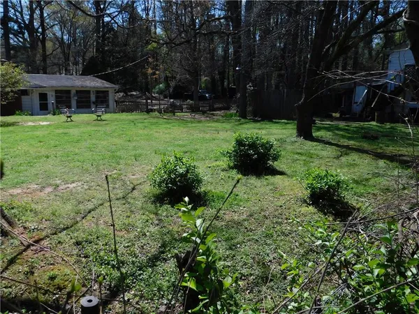 a view of a garden in front of house