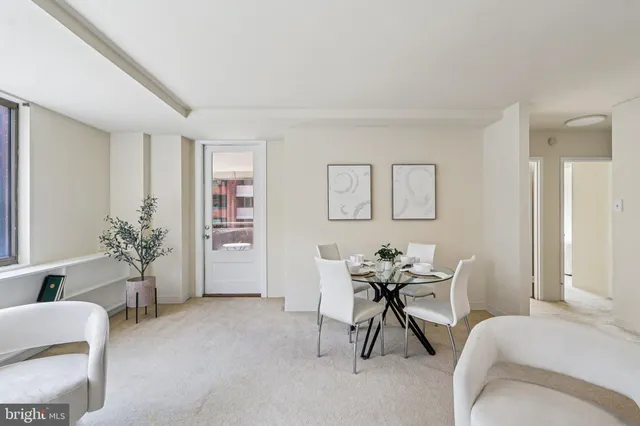 a kitchen with granite countertop a stove and a sink