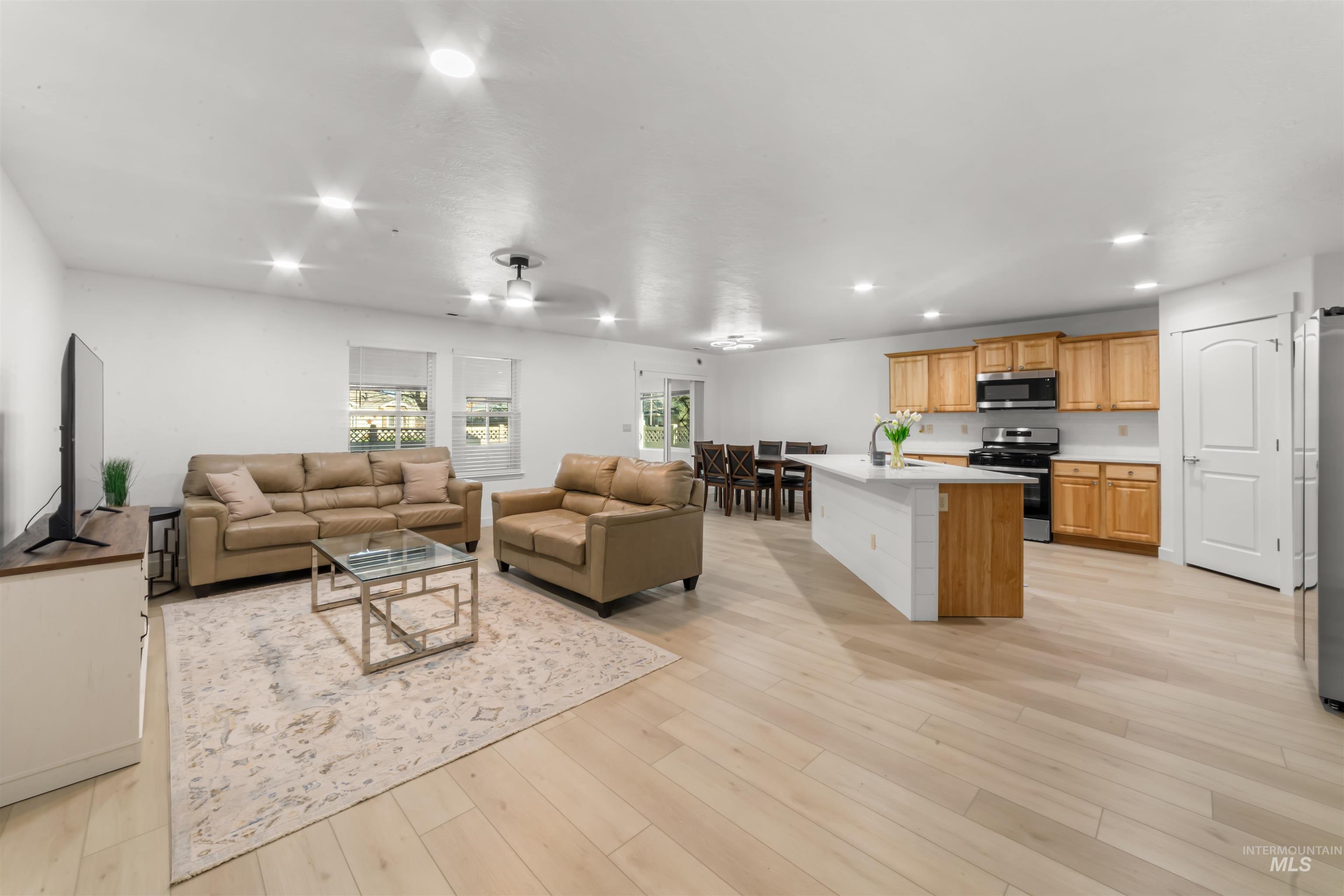 548 North Ripplerock Place Star, ID 83669 - Photo 25 of 42 Living area with recessed lighting and light wood-type flooring
