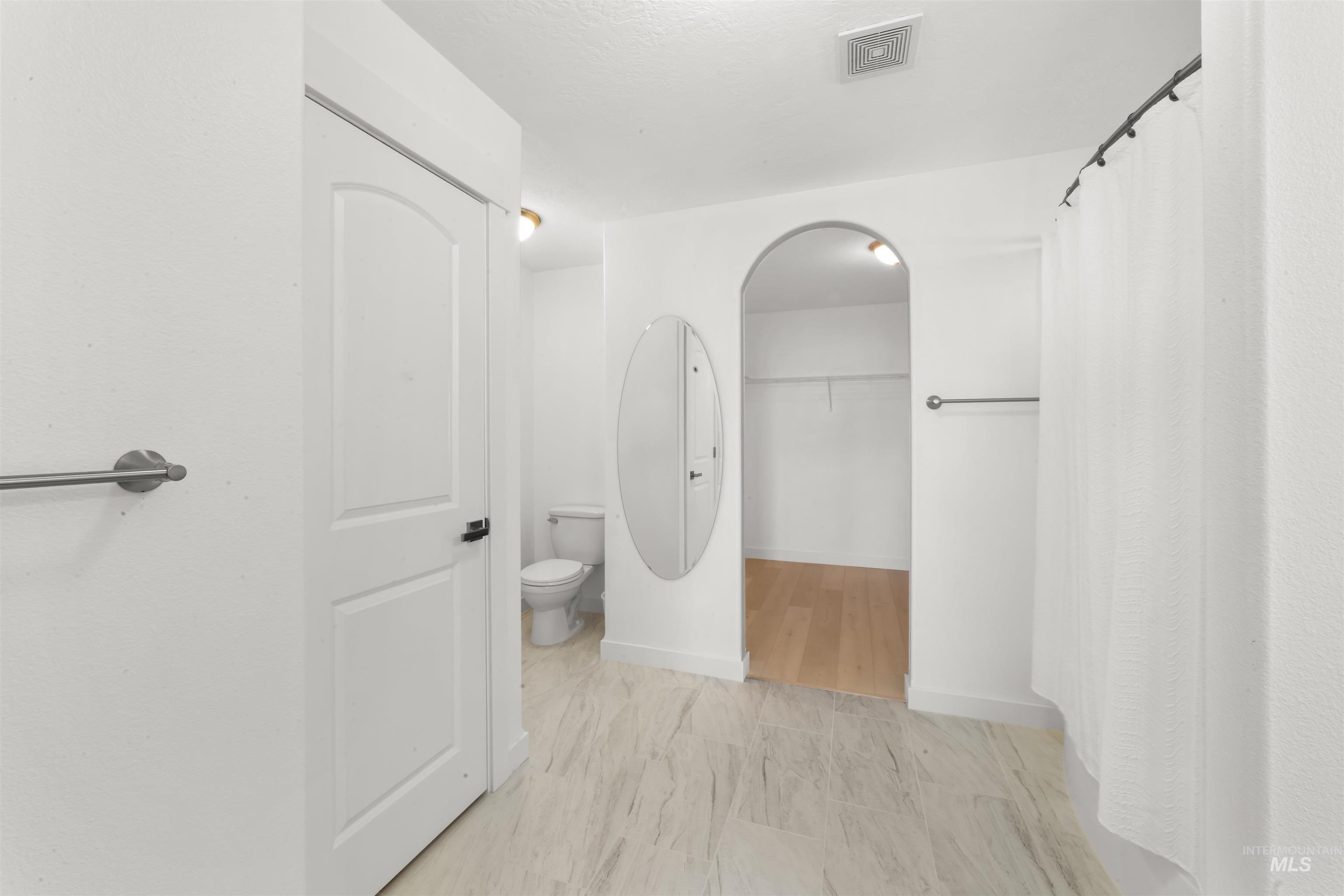 548 North Ripplerock Place Star, ID 83669 - Photo 29 of 42 Full bathroom with curtained shower and a spacious closet