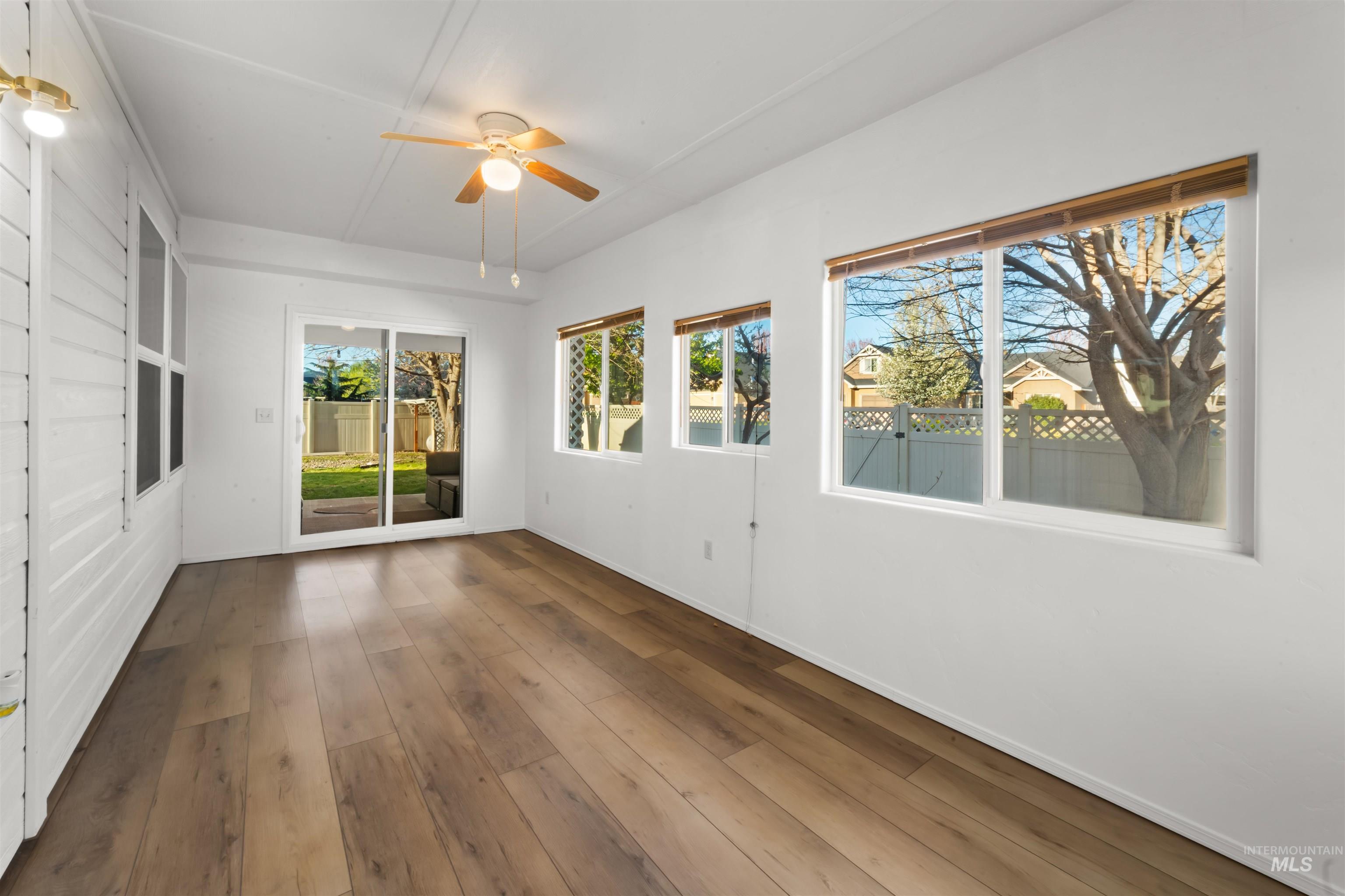 548 North Ripplerock Place Star, ID 83669 - Photo 35 of 42 Unfurnished sunroom with a ceiling fan