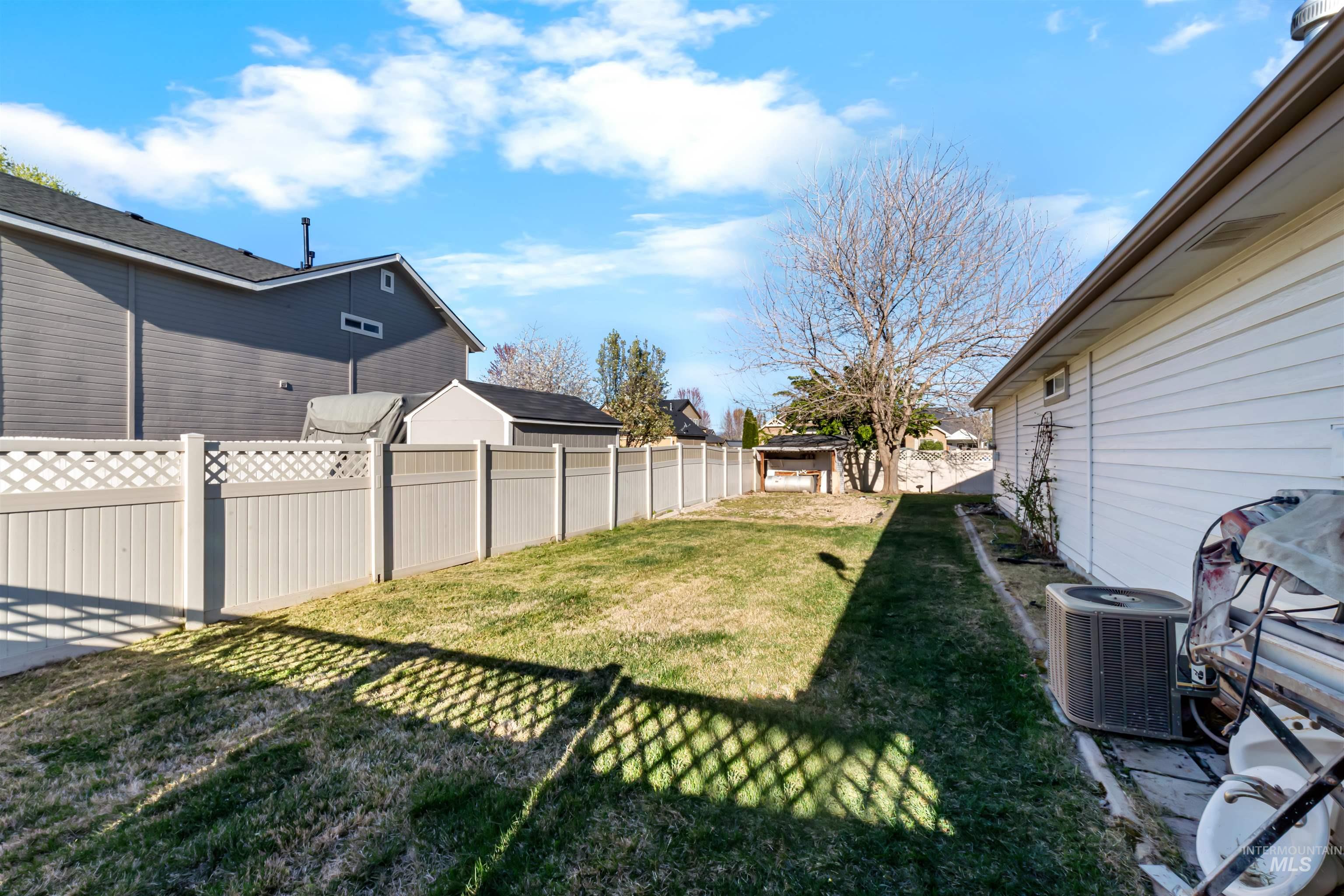 548 North Ripplerock Place Star, ID 83669 - Photo 4 of 42 View of fenced backyard