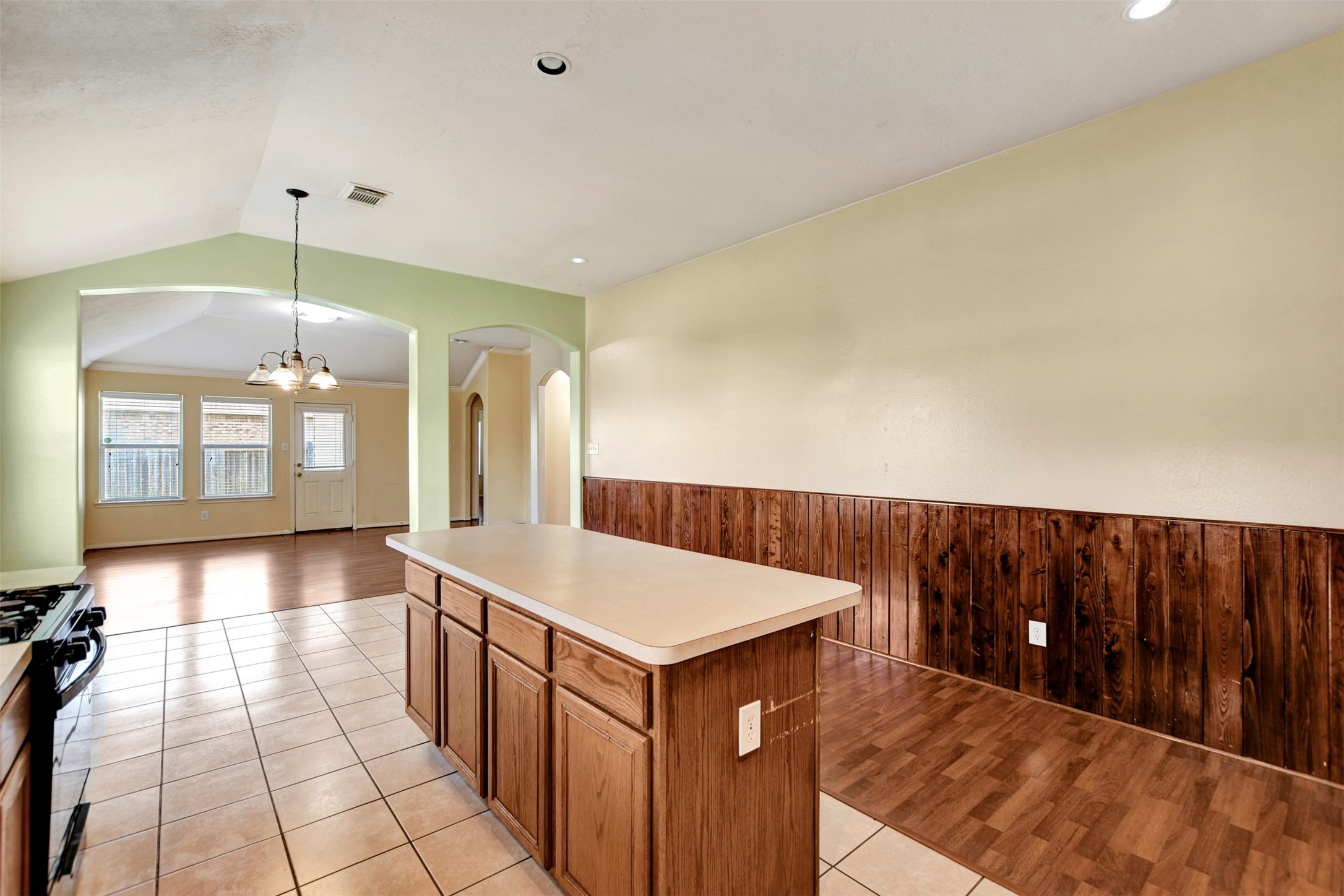 5918 Durango Mist Lane Katy, TX 77449 - Photo 26 of 41 a kitchen with a sink and chandelier