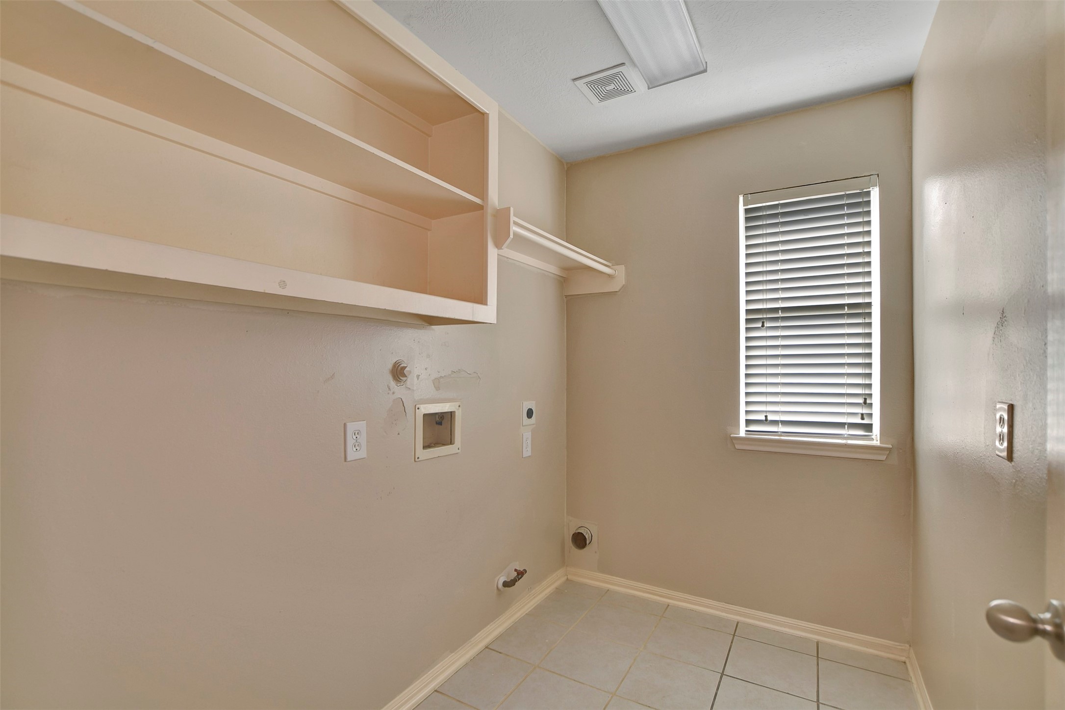5918 Durango Mist Lane Katy, TX 77449 - Photo 36 of 41 a bathroom with a window and a shower