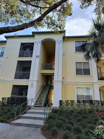 a front view of a house with stairs