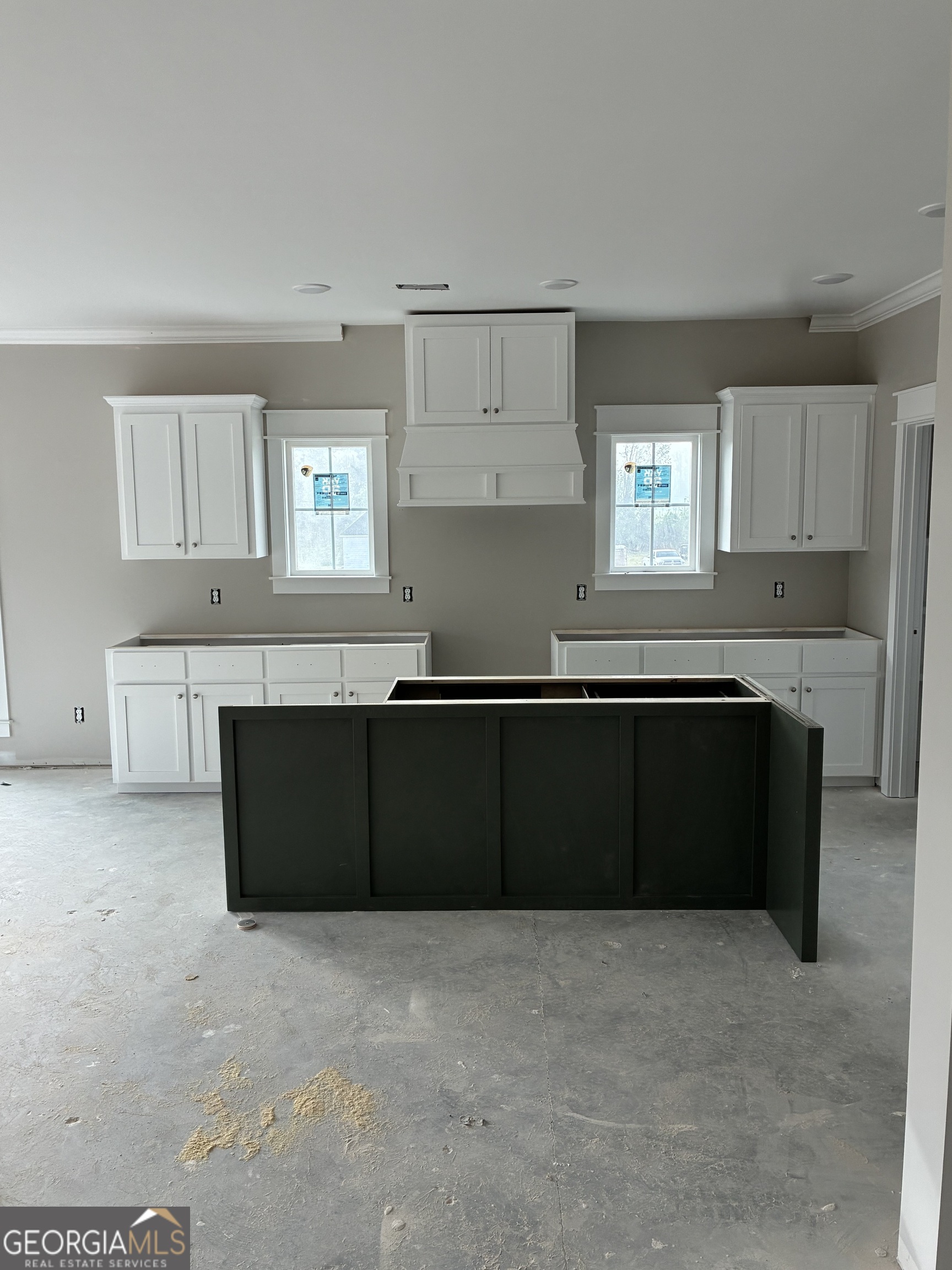 3167 Jason Franklin Road Register, GA 30452 - Photo 2 of 6 a kitchen with a sink and cabinets