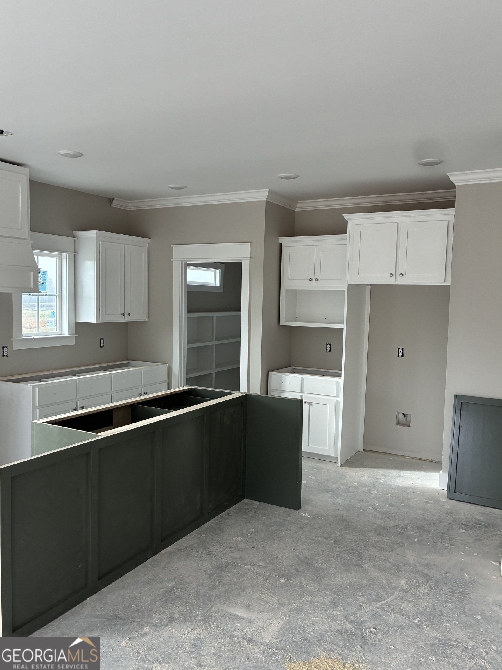3167 Jason Franklin Road Register, GA 30452 - Photo 3 of 6 a kitchen with a sink and cabinets