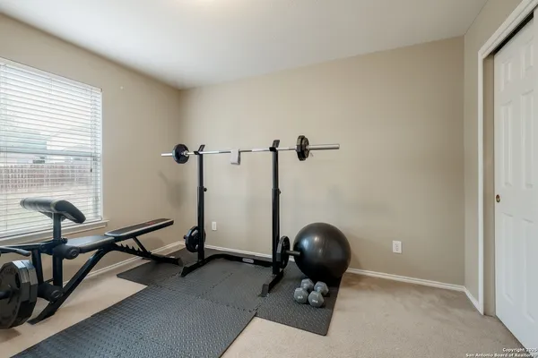 a view of a room with gym equipment