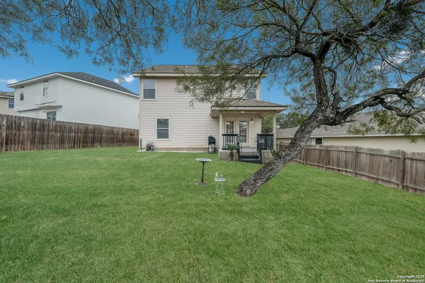 a view of a house with a park