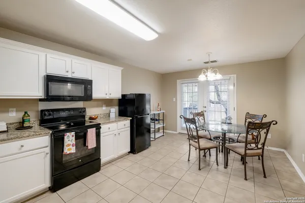 a view of a dining room kitchen and a window