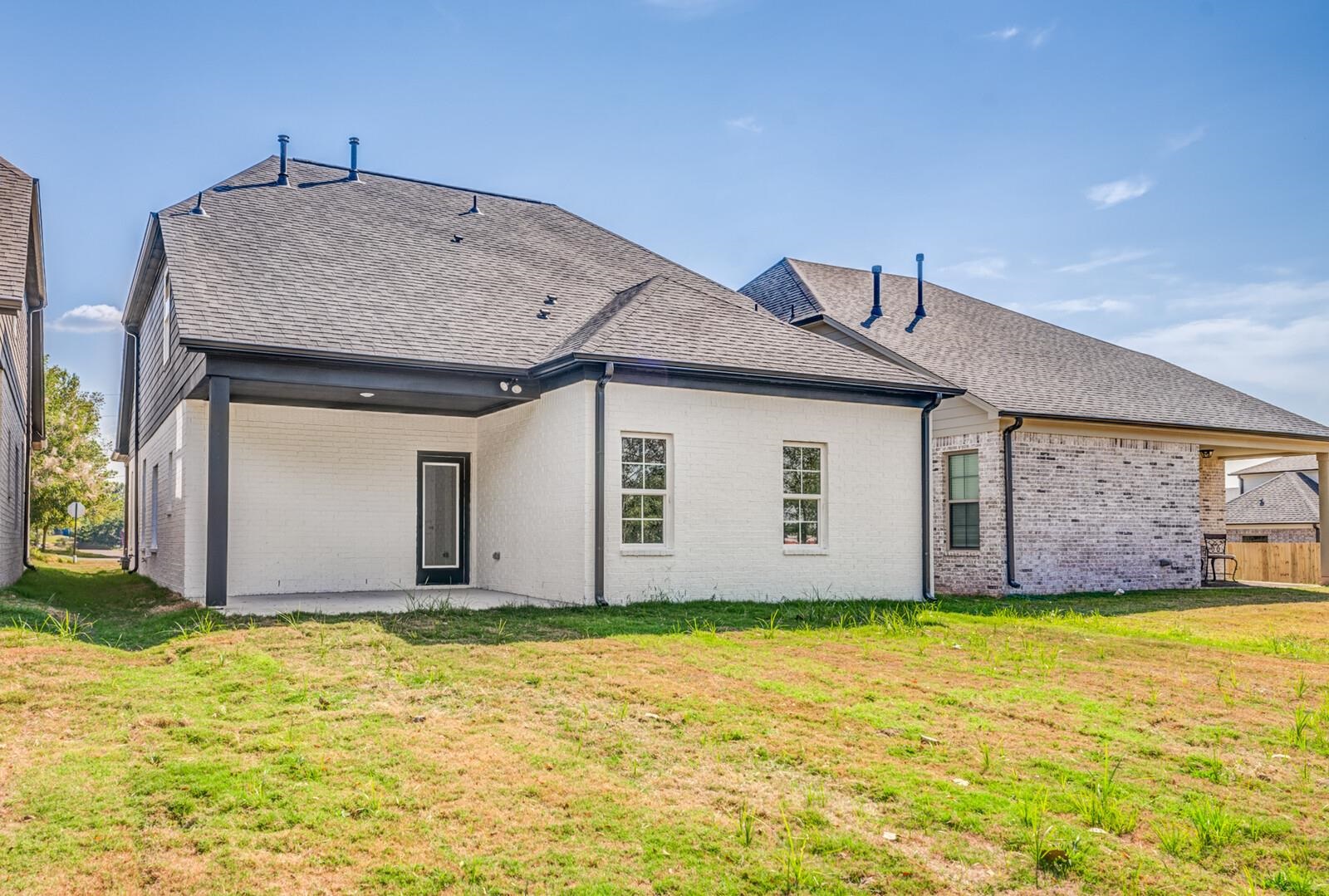 60 Umble Street Oakland, TN 38060 - Photo 38 of 40 a front view of house with yard and garage