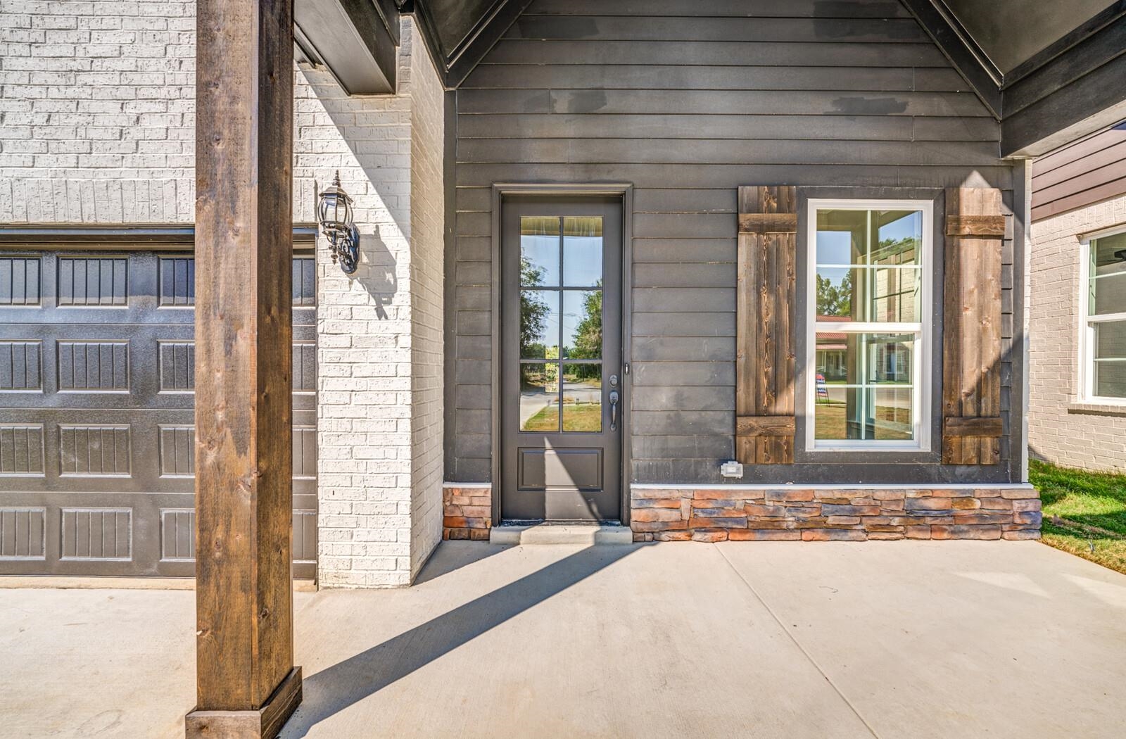 60 Umble Street Oakland, TN 38060 - Photo 4 of 40 a front view of a house with a outdoor space
