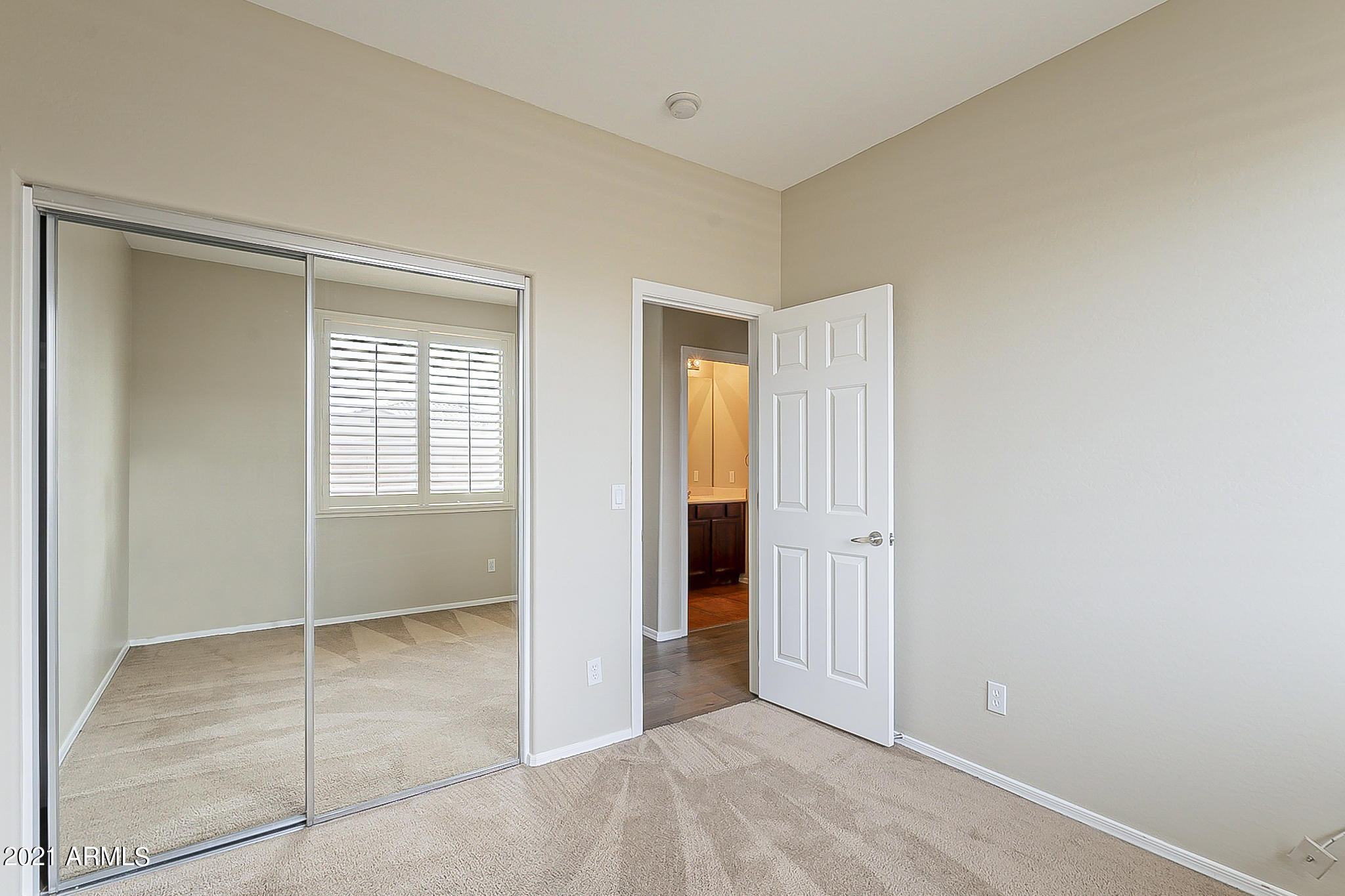 15346 West Boca Raton Road Surprise, AZ 85379 - Photo 37 of 45 an empty room with windows and closet