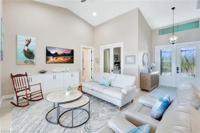 a living room with furniture and a table