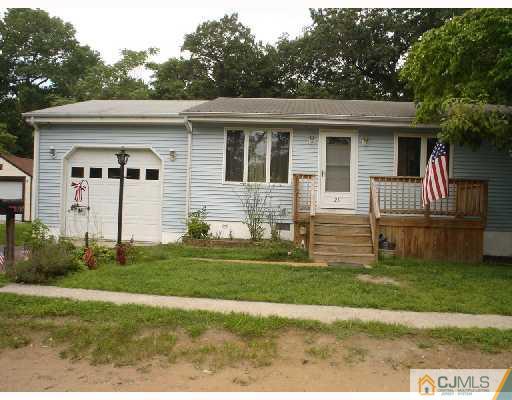 25 Red Bank Road Spotswood, NJ 08884 - Photo 1 of 2 a view of a house with a yard
