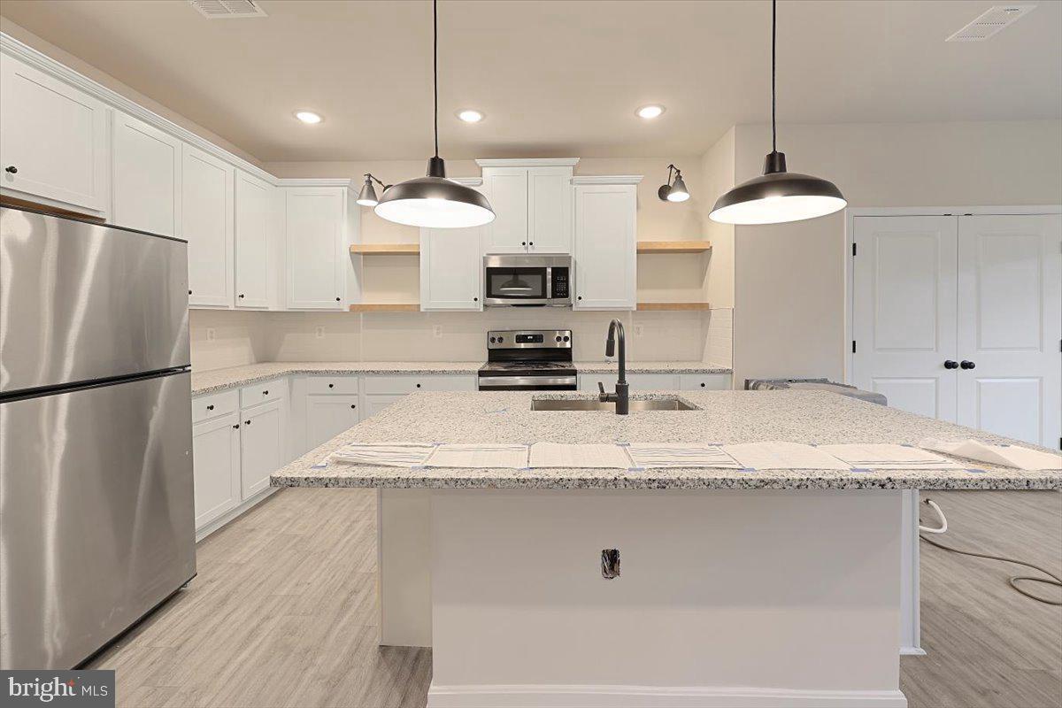 115 (site 2) Rabbit Road Hedgesville, WV 25427 - Photo 7 of 31 Smiliar Construction Kitchen Island