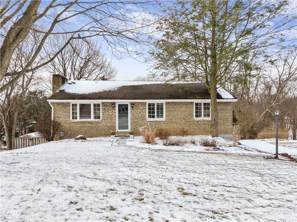 903 Wible Run Road Pittsburgh, PA 15209 - Photo 1 of 33 a backyard of white house