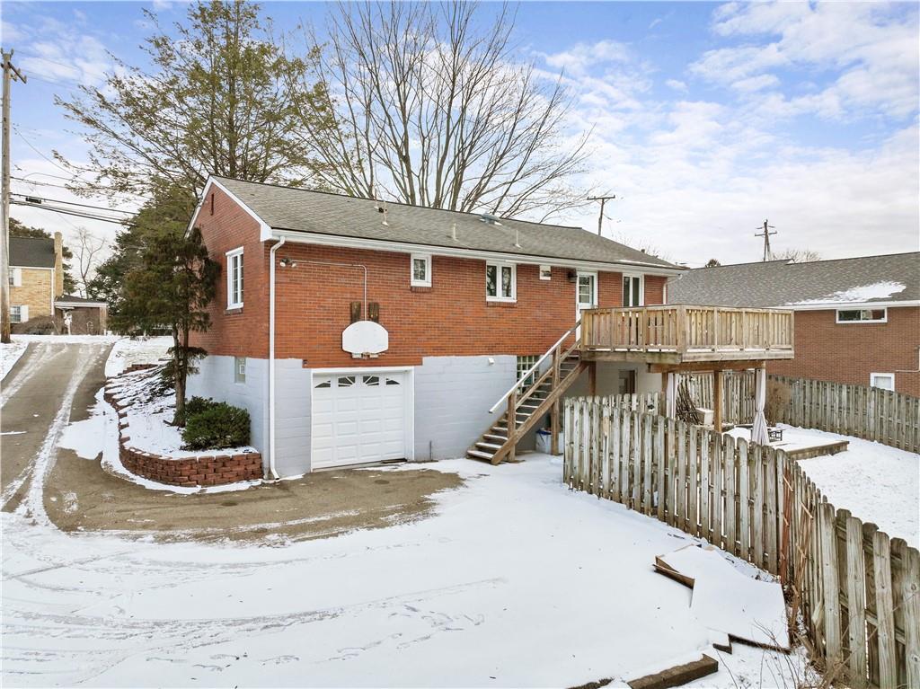 903 Wible Run Road Pittsburgh, PA 15209 - Photo 2 of 33 a front view of a house with a yard