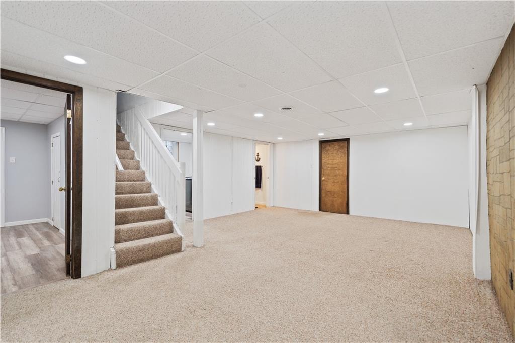 903 Wible Run Road Pittsburgh, PA 15209 - Photo 23 of 33 a view of an empty room with stairs