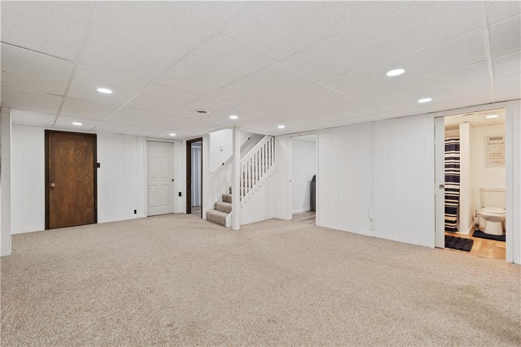 903 Wible Run Road Pittsburgh, PA 15209 - Photo 24 of 33 a view of an empty room with a ceiling fan