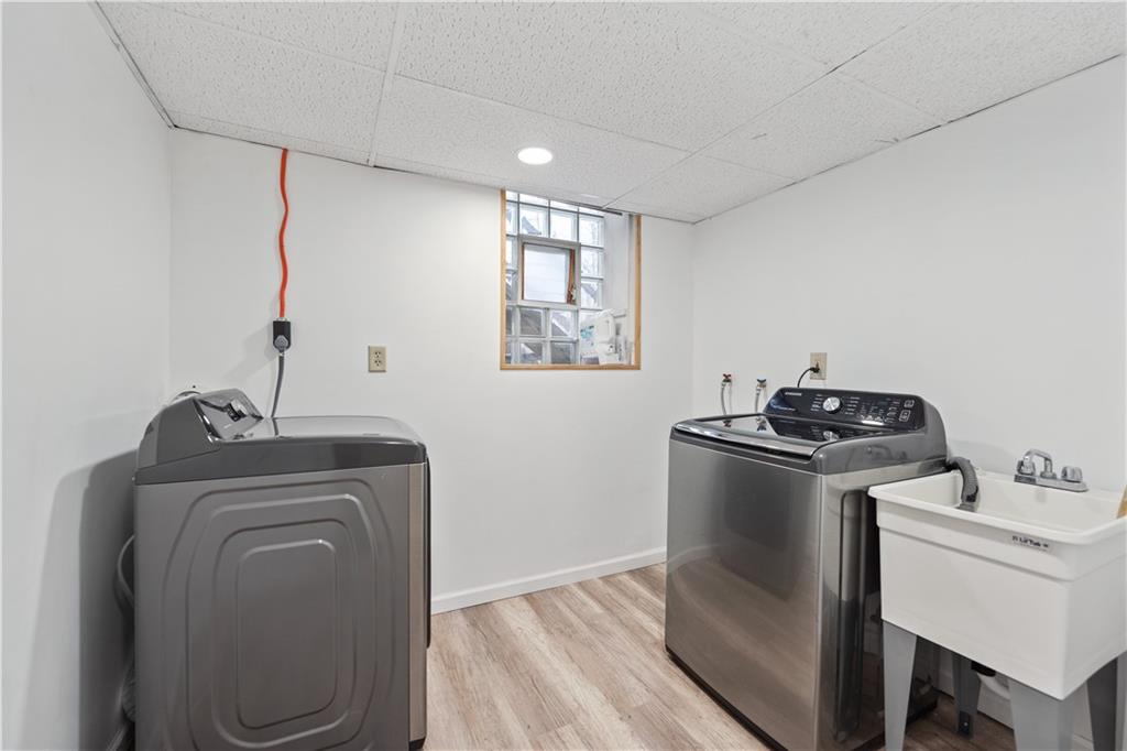 903 Wible Run Road Pittsburgh, PA 15209 - Photo 27 of 33 a view of storage and utility room with washer and dryer