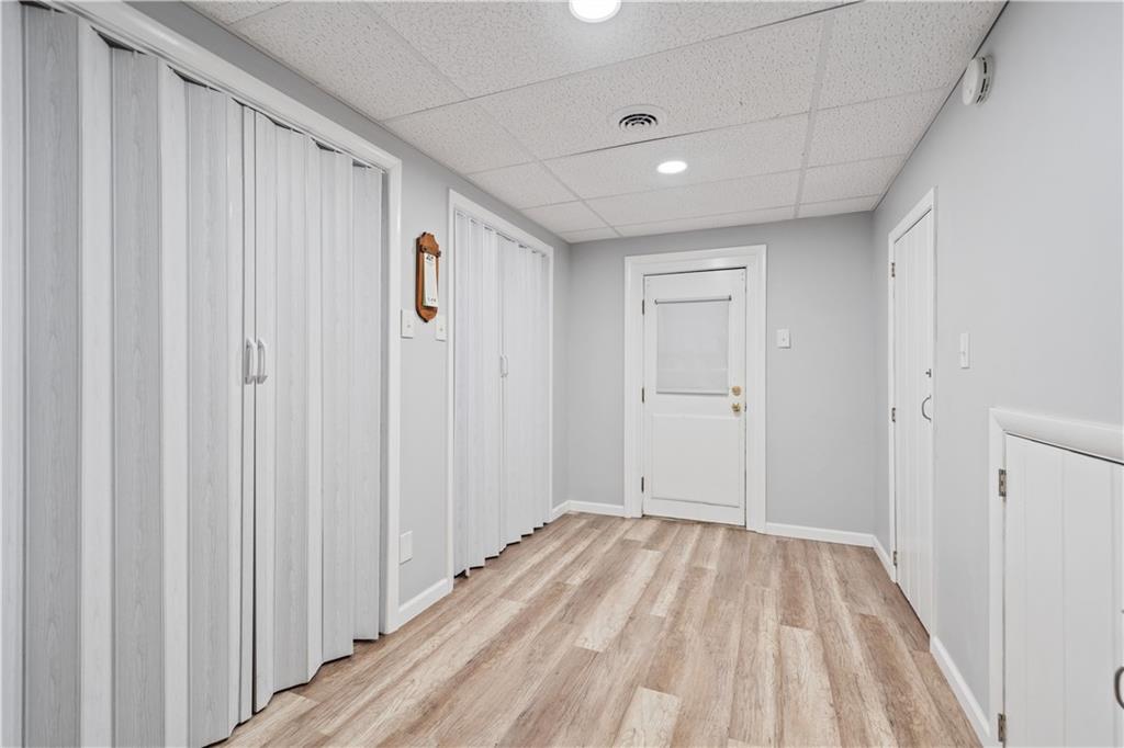 903 Wible Run Road Pittsburgh, PA 15209 - Photo 28 of 33 a view of a room with wooden floor